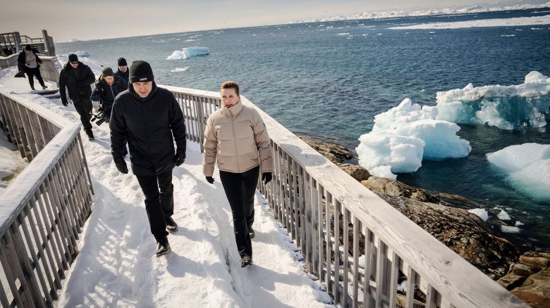 Denmark's Prime Minister Mette Frederiksen walks with Greenland's acting Prime Minister, Múte B. Egede, during a three-day visit in Nuuk, Greenland.