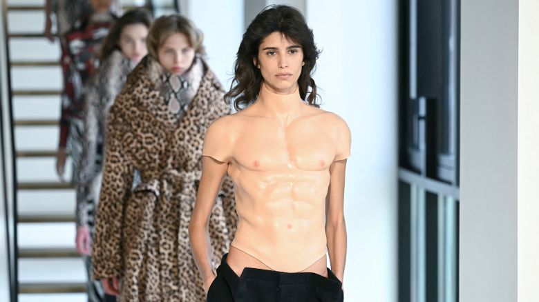 Argentinian model Mica Arganaraz (R) acknowledges the audience with models after presenting creations by Duran Lantink for the Womenswear Ready-to-wear Fall-Winter 2025/2026 collection as part of the Paris Fashion Week, in Paris on March 9, 2025. (Photo by Bertrand GUAY / AFP) (Photo by BERTRAND GUAY/AFP via Getty Images)          