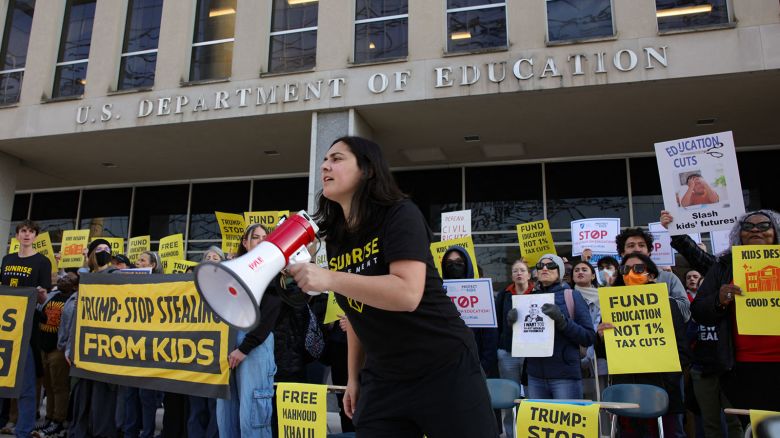 Demonstrators gather outside of the offices of the U.S. Department of Education in Washington, D.C. on March 13, 2025, to protest against mass layoffs and budget cuts at the agency, initiated by the Trump administration and DOGE.