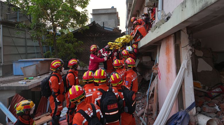 Mandatory Credit: Photo by Xinhua/Shutterstock (15234899b)
Members of the Chinese rescue team extricate a male survivor in Mandalay, Myanmar, April 2, 2025. The Chinese rescue team successfully extricated a male survivor at a hotel on Wednesday afternoon in Mandalay, Myanmar.
 The man, an employee of the E-outfitting Golden Country Hotel, had been trapped for over 120 hours and was in stable condition when rescued.
 The survivor has been transferred to a local hospital for further treatment. This marks the ninth survivor successfully rescued by the Chinese rescue teams.
Photoflash | Another Survivor Pulled From Rubble by Chinese Rescuers in Quake Hit Myanmar City Mandalay - 02 Apr 2025